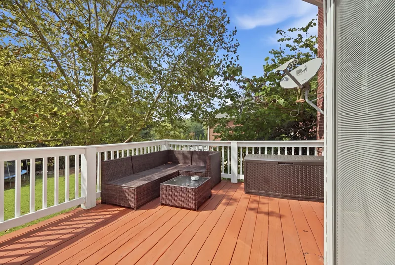 Deck off the kitchen with outdoor seating