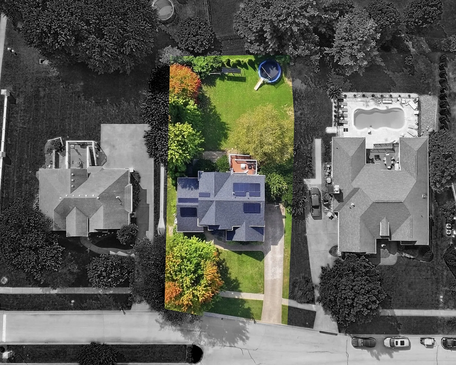 The lot at 6002 John Moser Way from above, in color among the neighbors