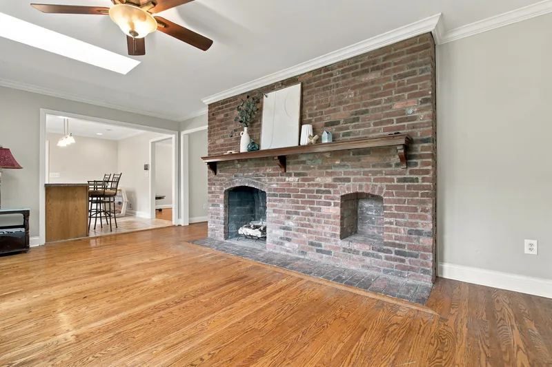 Family room and its brick fireplace