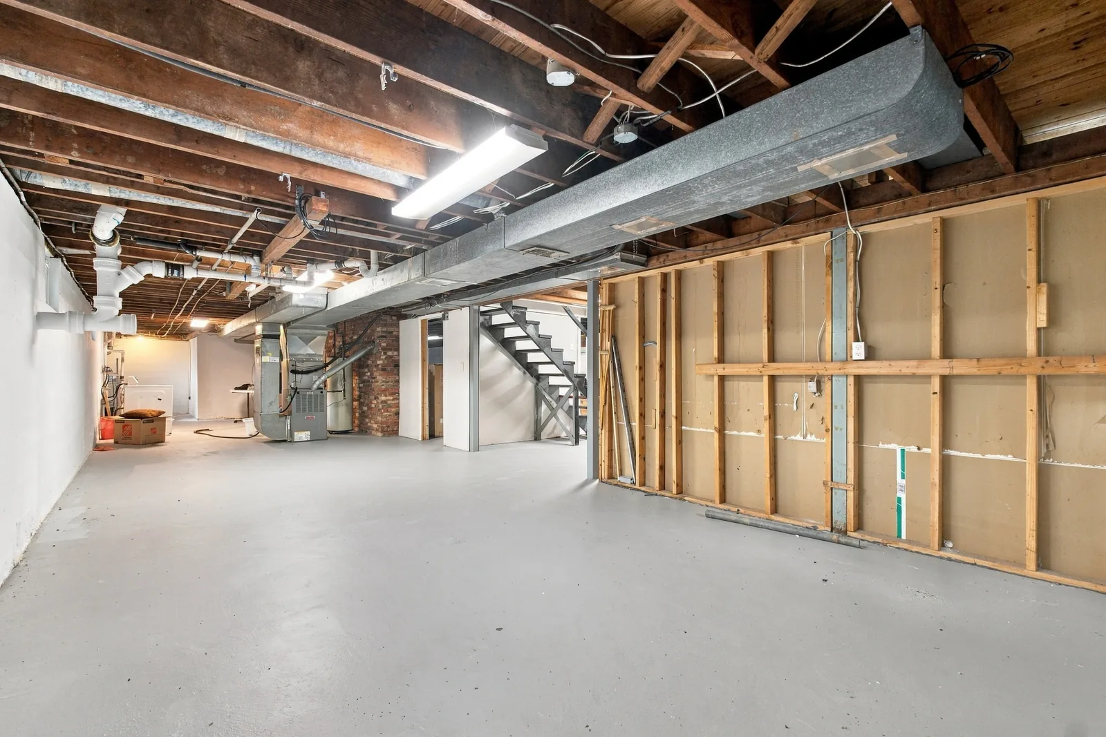 The unfinished basement and the stairs