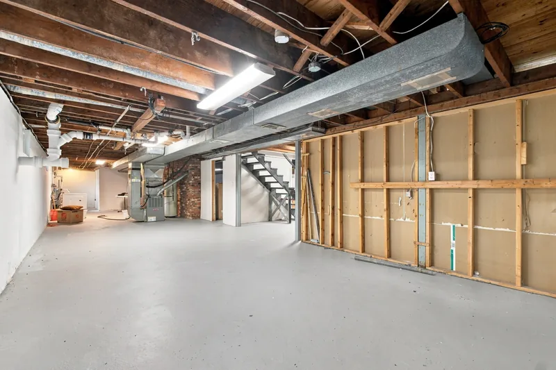 Unfinished basement and the stairs